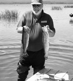 Horsham angler Bill Rowe with a catch of rainbow trout from Lake Wartook.